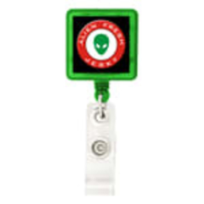 A green rectangular badge holder with a clear strap and a logo displayed in the centre.