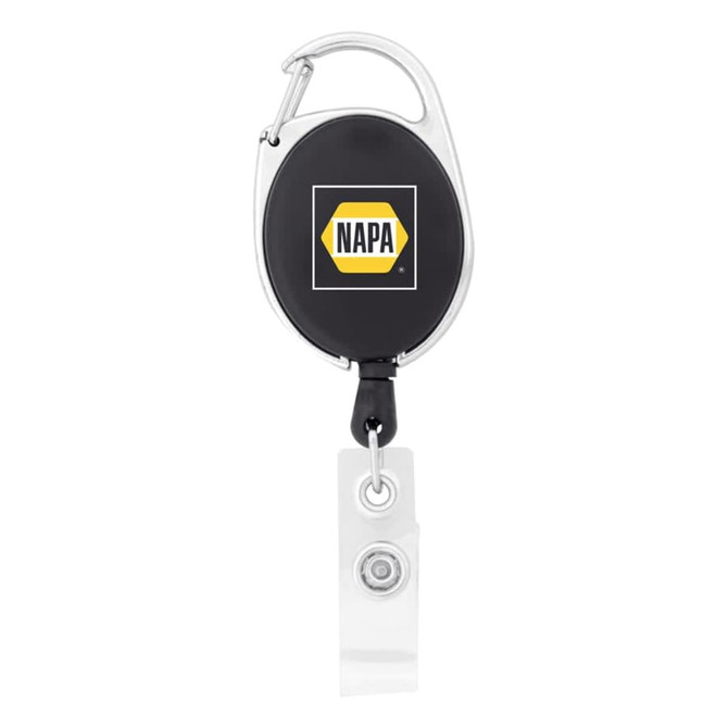 A retractable badge holder in black with a silver clip and clear strap, featuring a logo on the front.