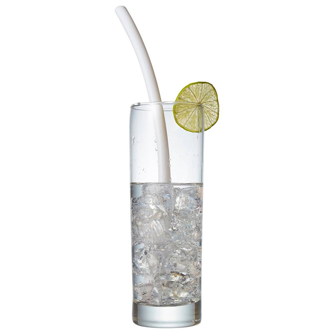 A clear glass filled with ice and water, featuring a white reusable silicone straw and a slice of lime.
