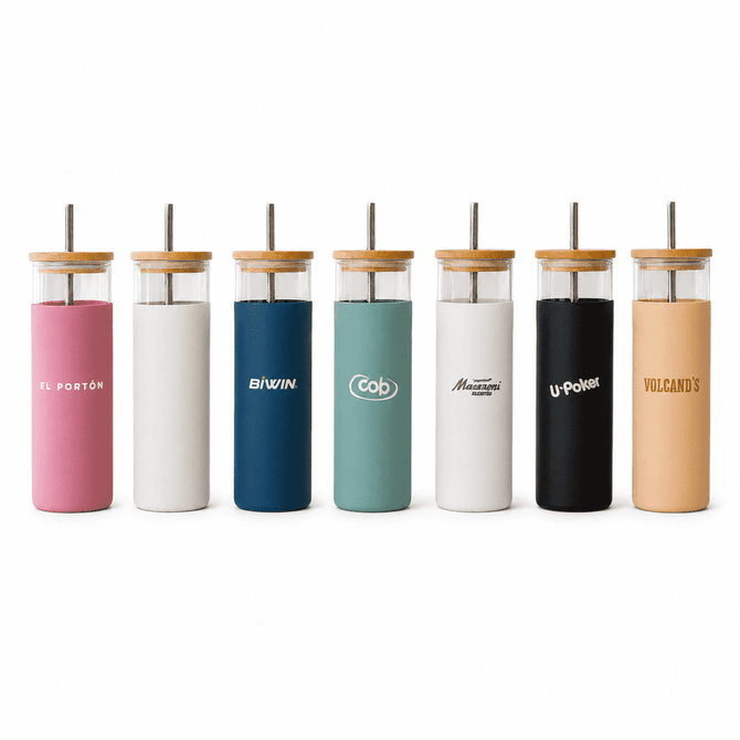 A drink bottle set featuring a pink, white, teal, black, and orange tumbler with natural wood lids and logos.