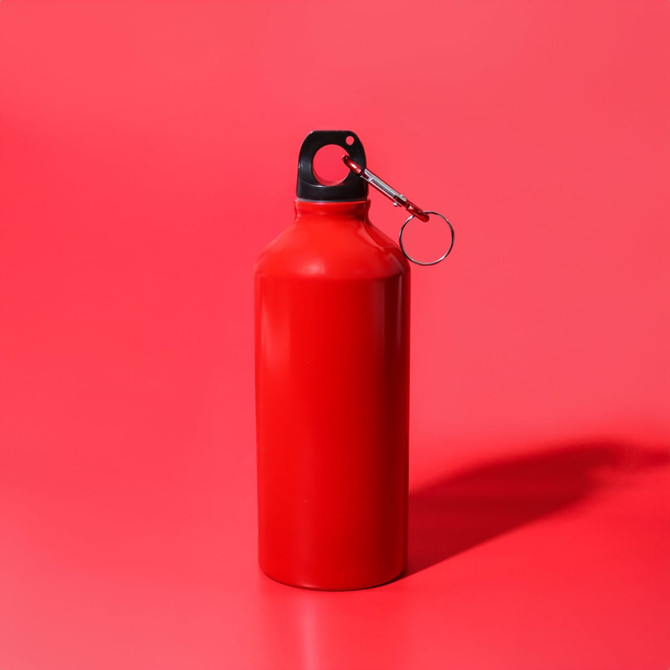 A drink bottle with a sleek red finish and a black attachment ring on the cap. It has a logo on the bottle.