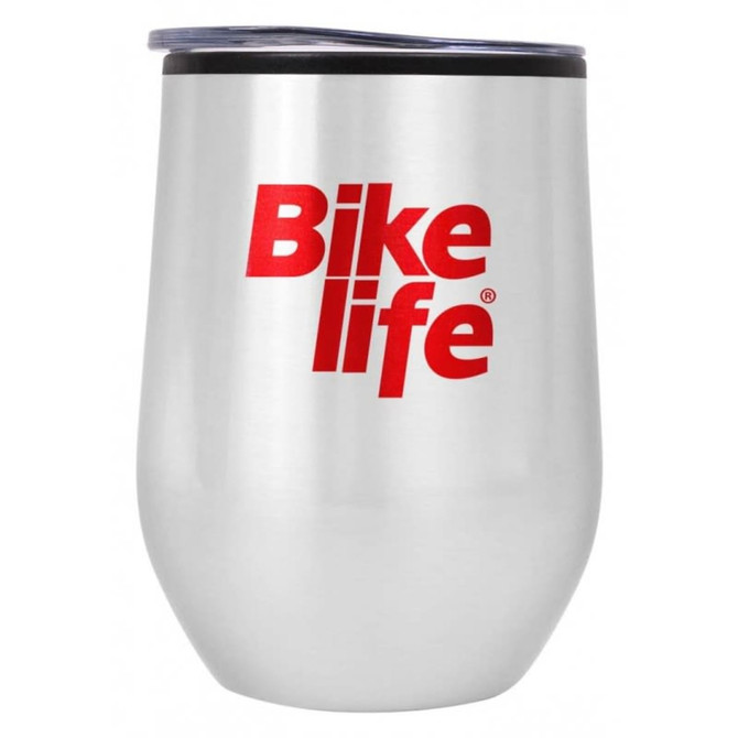 A drink bottle in a silver stainless steel finish with a black lid and a red logo.