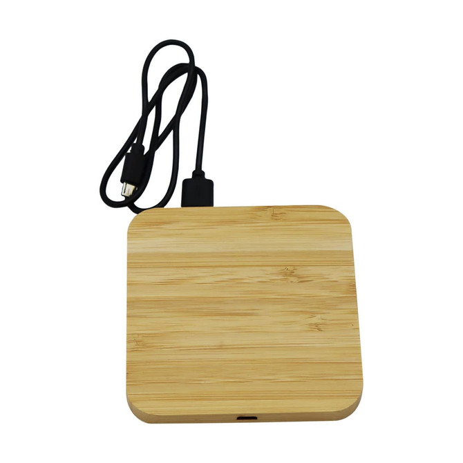 A bamboo wireless charging dock in a square shape, featuring a black charging cable attached.