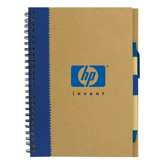 A recycled paper notebook with a blue spiral binding and a blue pen attached. It features a logo on the front.