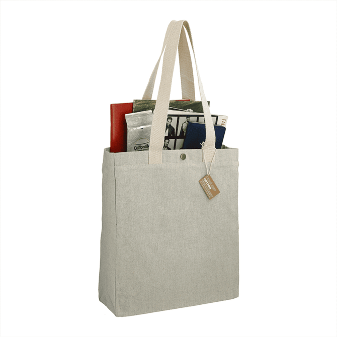 A recycled cotton tote bag in natural colour, featuring sturdy handles and filled with assorted items. It has a logo.