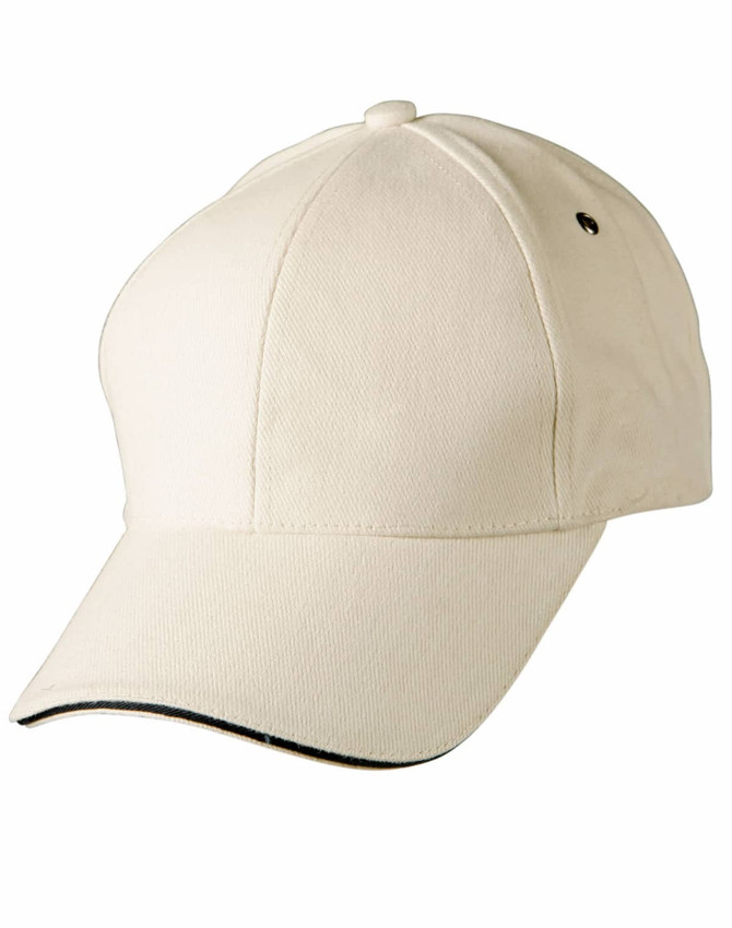 A cream-coloured cap with a curved brim and a small logo on the side.
