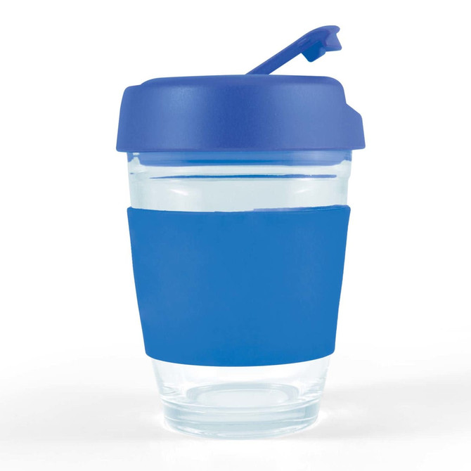 A reusable coffee cup with a transparent body and a blue silicone sleeve and flip lid.