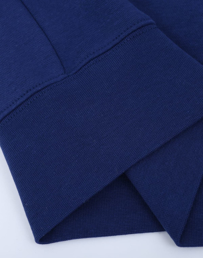 A navy crew fleece jumper featuring ribbed cuffs and a soft texture, designed for comfort.