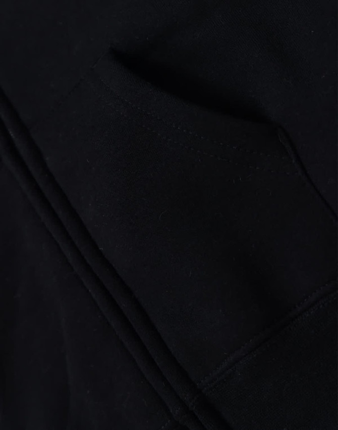 A black full-zip fleecy hoodie featuring a kangaroo pocket and a logo. Soft fabric and stylish design.