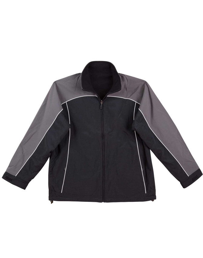 A reversible jacket in black and grey with contrasting design elements and a logo on the left side.