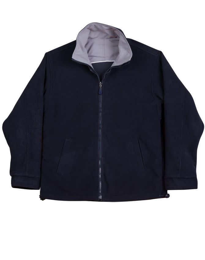 A reversible jacket featuring a tri-colour design, primarily in navy with a grey interior and side pockets.
