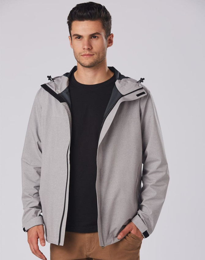 A grey waterproof performance jacket featuring a hood, worn by a model against a plain background.