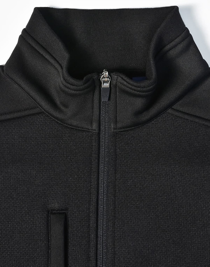 A black men's jacquard fleece jacket featuring a high collar and a central zip. It has a pocket on the front and a logo.