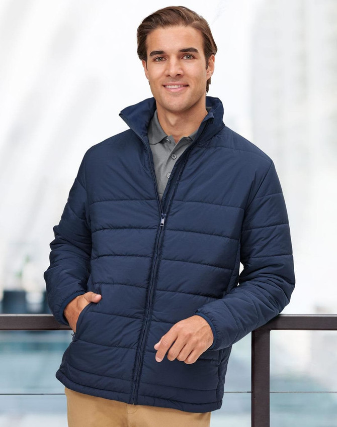 A navy insulated puffer jacket with a zip front and high collar, featuring a logo on the chest.