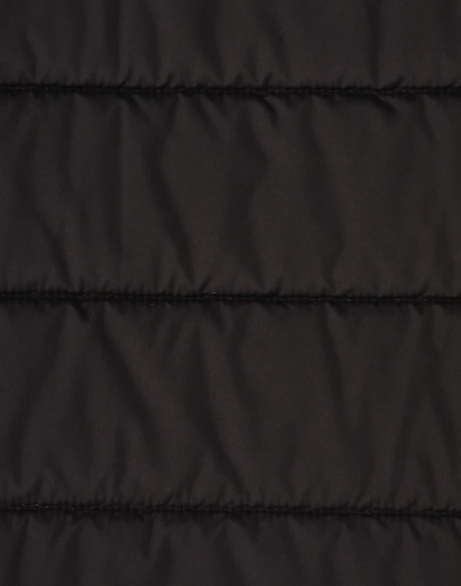 A black insulated puffer jacket with a 3D cut, featuring stitched panels for added texture.