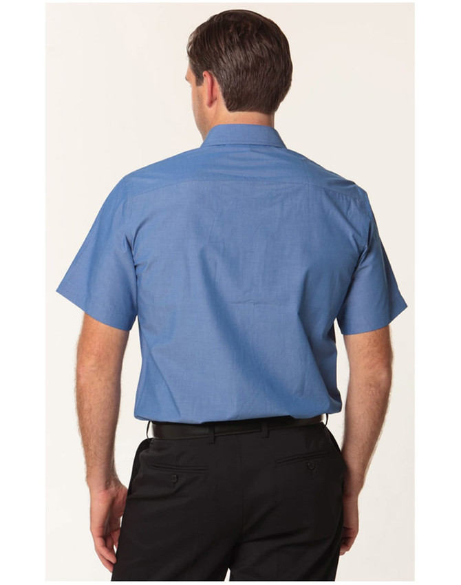 A short sleeve button-up shirt in light blue, featuring a collar and a logo on the back.