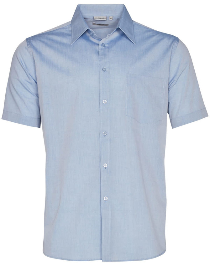 A light blue short sleeve button-up shirt with a chest pocket and a logo.