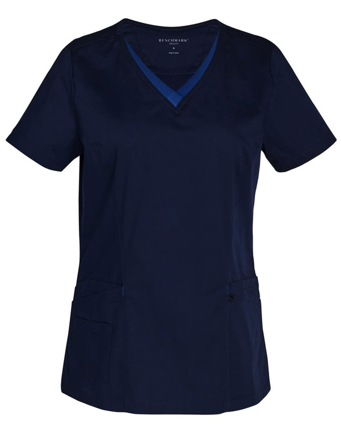 A navy blue scrub top featuring contrast colour detailing and two front pockets. Includes a logo.