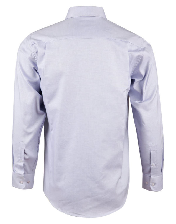 A light blue long sleeve button-up shirt featuring a contrasting dot design and a logo.