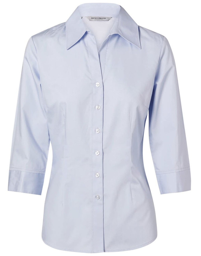 A light blue women's button-up shirt with 3/4 sleeves and a collar. Features a solid colour and has a logo.