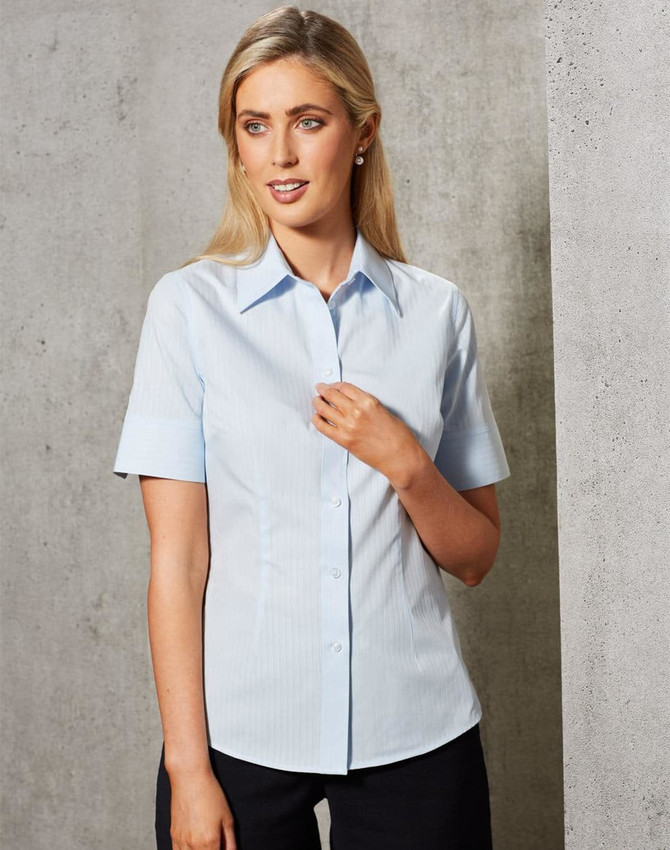 A light blue women's short-sleeve button-up shirt with a self-stripe pattern, featuring a classic collar and a sleek fit.