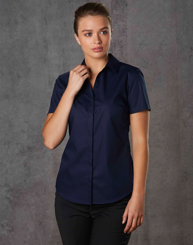 A navy blue short-sleeved button-up shirt for women, featuring a sleek design and a subtle texture.