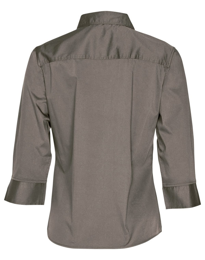 A women's 3/4 sleeve military shirt in olive green, featuring a collared neck and a back yoke. It has a logo.