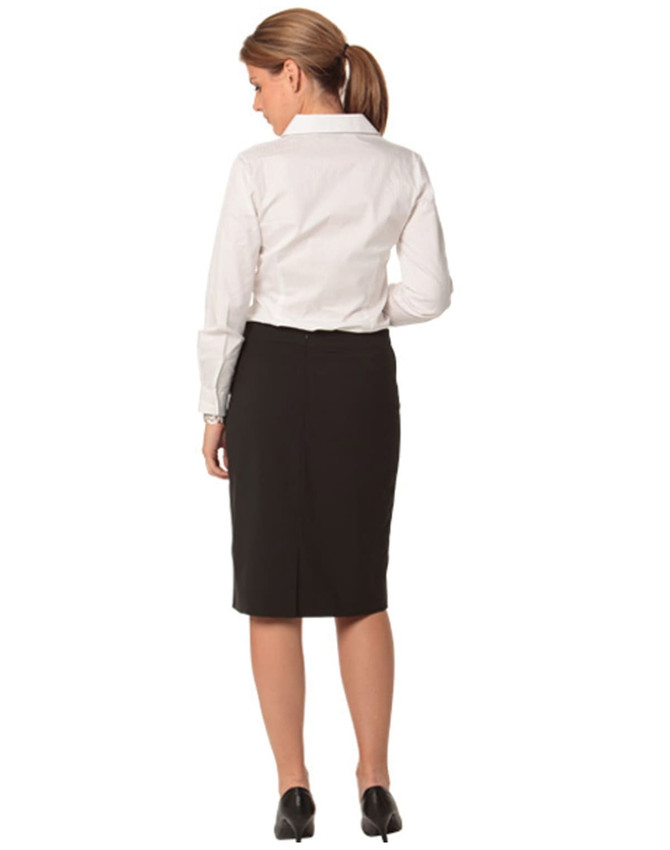 A black mid-length lined pencil skirt made from poly/viscose stretch, paired with a white shirt.