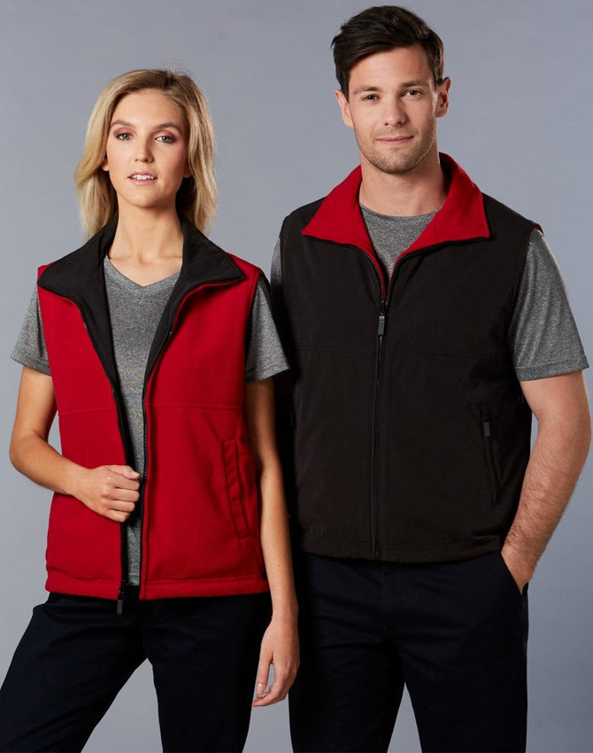 A unisex reversible vest featuring red and black colours, displayed on a male and female model. It includes a logo.