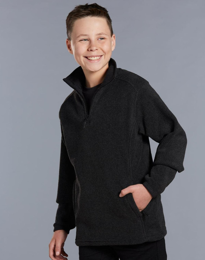 A kid's half zip polar fleece pullover in dark grey, featuring a collared neck and a pocket.