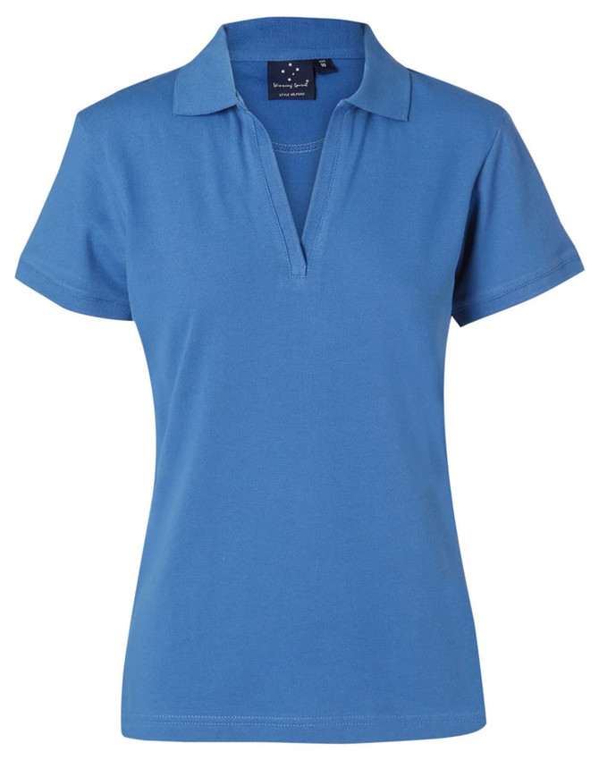 A ladies' polo shirt in a vibrant blue colour, featuring a classic collar and short sleeves. It includes a logo.