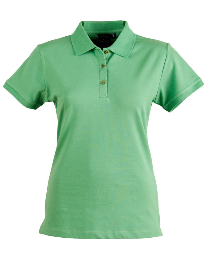 A green ladies' polo shirt featuring a collar and three buttons, with a logo on the chest.