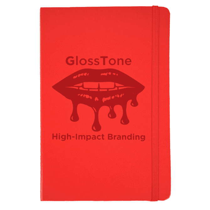 A red journal with a glossy finish and a logo on the front, featuring a design of lips and dripping effect.