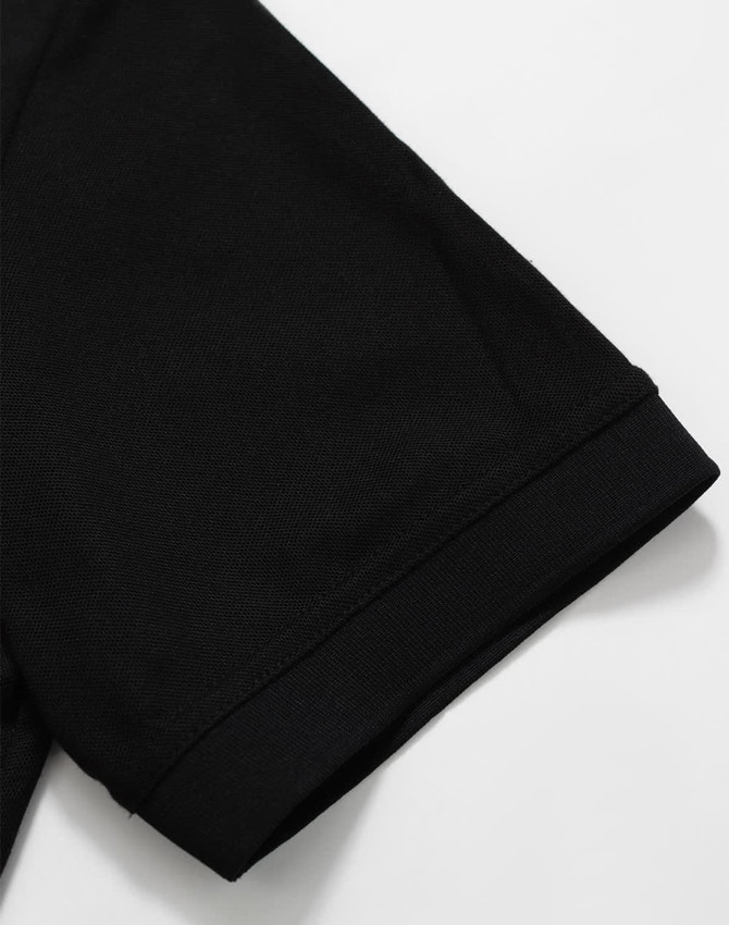 A black Men's Truedry Pique Polo shirt showcasing the sleeve detail. The shirt features a logo.