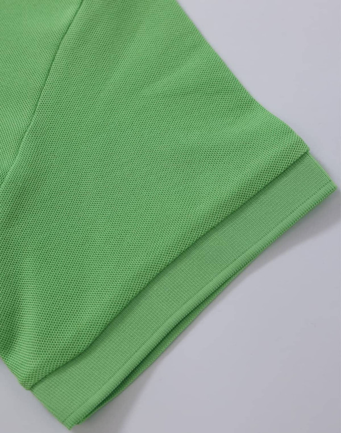 A vibrant green Ladies' Truedry Pique Polo showcasing the sleeve and hem details. Features a logo.