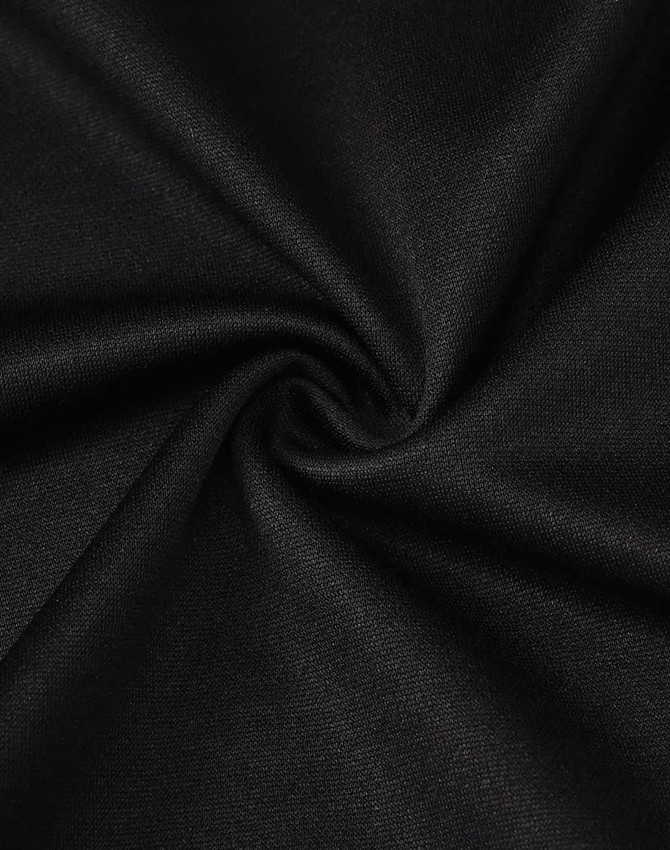 A close-up of black fabric showing a smooth texture, ideal for a polo shirt. The fabric has a slight sheen and flexibility.