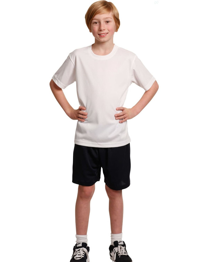 Kids cooldry sports shorts in black, paired with a white sports t-shirt. The outfit is modelled by a young boy.