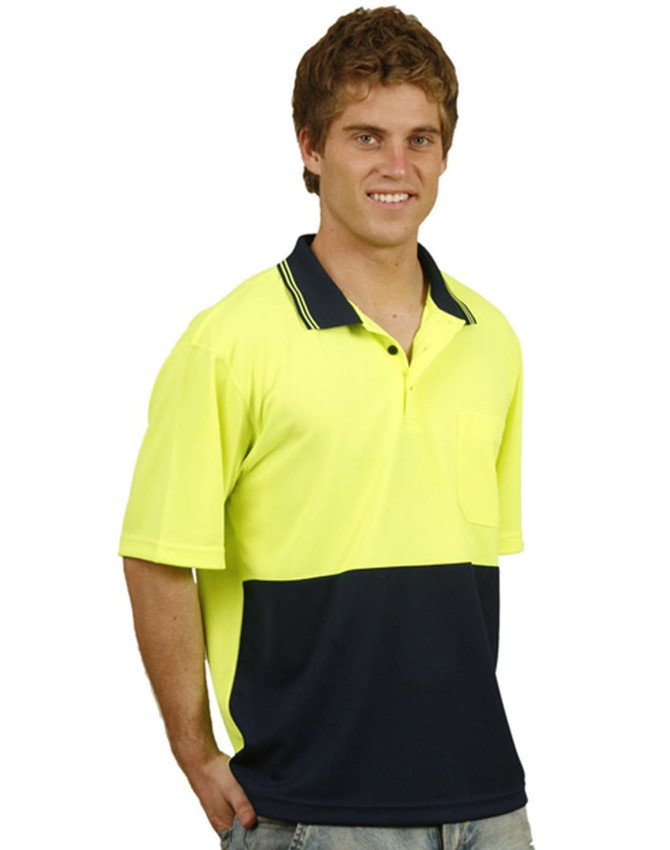 A high-visibility short-sleeve safety polo in bright yellow with a navy blue bottom section and a pocket.