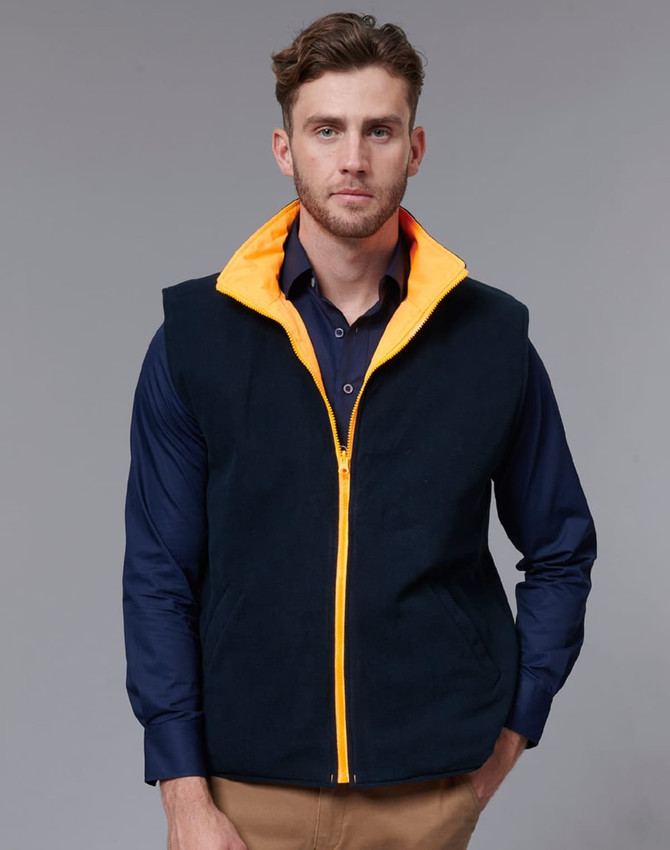 A navy reversible safety vest with an orange lining, featuring a zip front and two pockets. Includes a logo.
