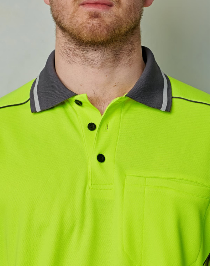 A hi-vis lime green polo shirt with a grey collar and a pocket, featuring a logo on the chest area.