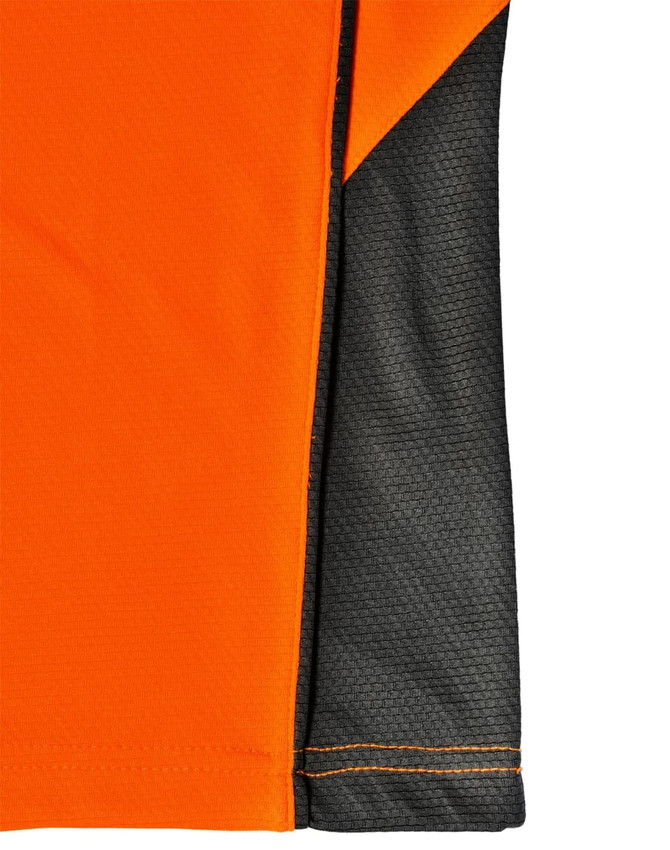 A close-up of an orange and charcoal polo shirt featuring a textured design and a logo.