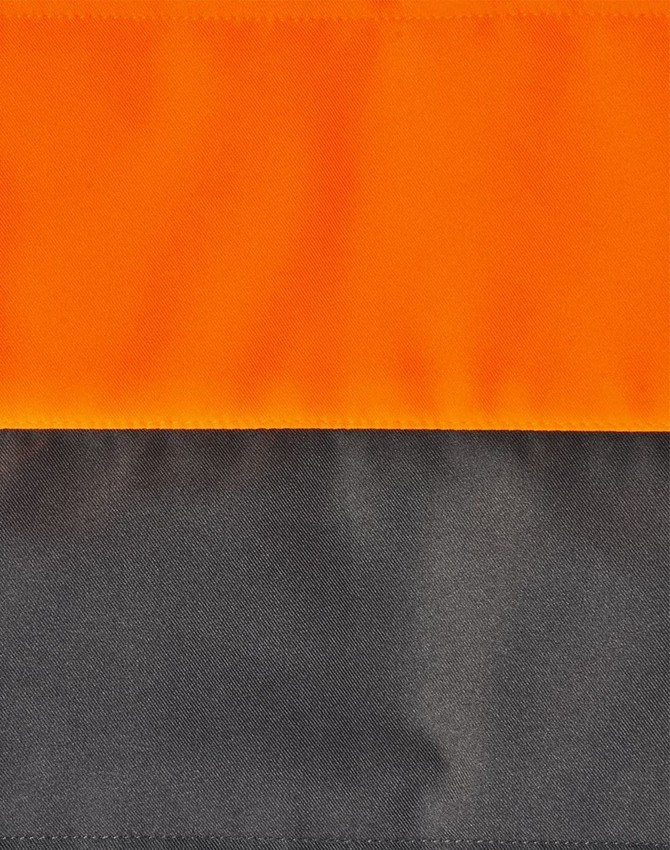 A quilted safety jacket featuring a bright orange upper section and a dark grey lower section, with a logo present.