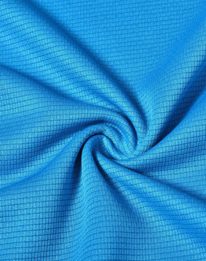 A textured fabric in bright blue, showcasing a grid pattern suitable for lightweight performance wear.