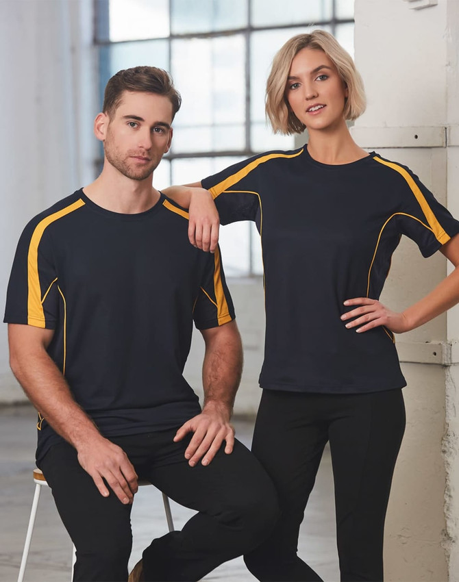 A black and yellow short-sleeve T-shirt featuring a logo, modelled by a man and a woman in a bright setting.