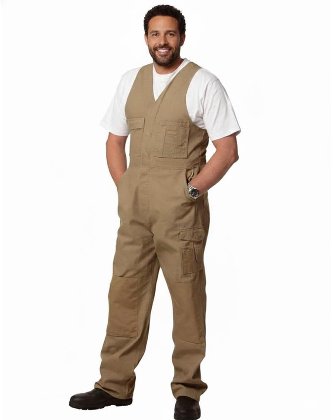 Men's DURA WEAR action back overalls in khaki, featuring multiple pockets and a logo, worn by a man.