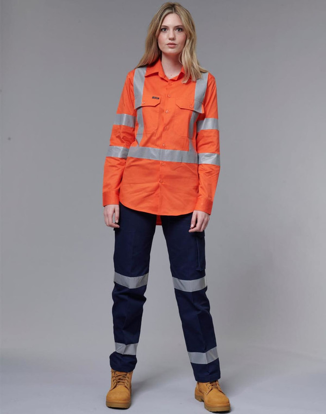 Ladies' heavy cotton drill pants in navy with 3M reflective tape. Model wears a matching high-visibility orange shirt.