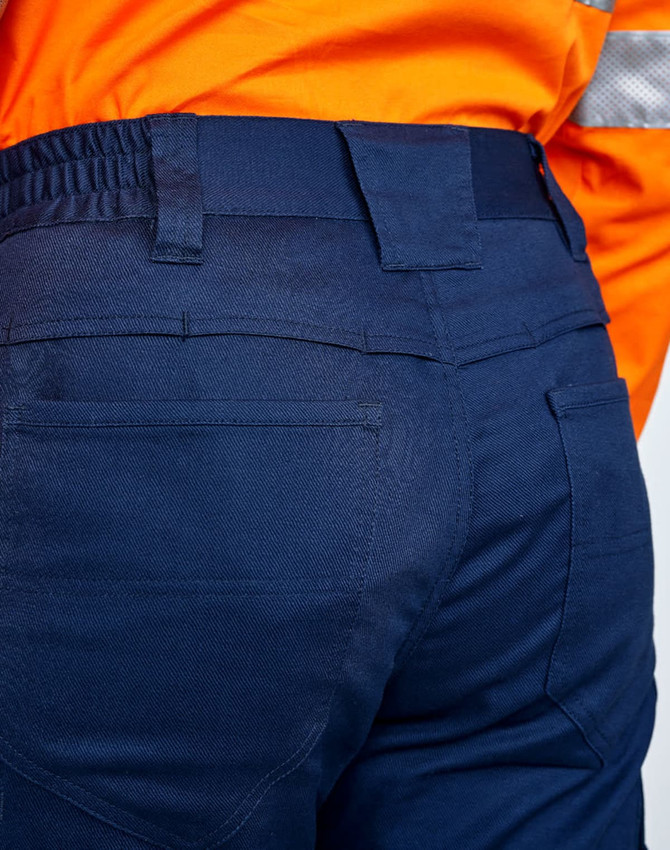 Navy blue unisex cotton stretch ripstop work pants with an elastic waistband and back pockets. Features a logo.