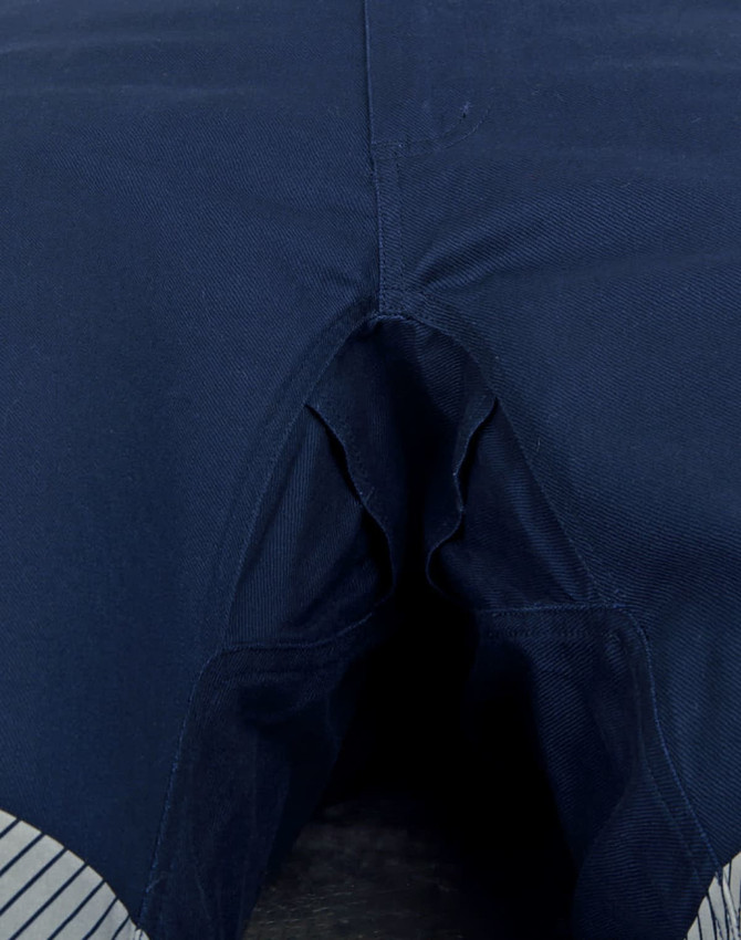 Unisex cotton stretch ripstop segmented work pants in navy, featuring a branded logo and segmented design.