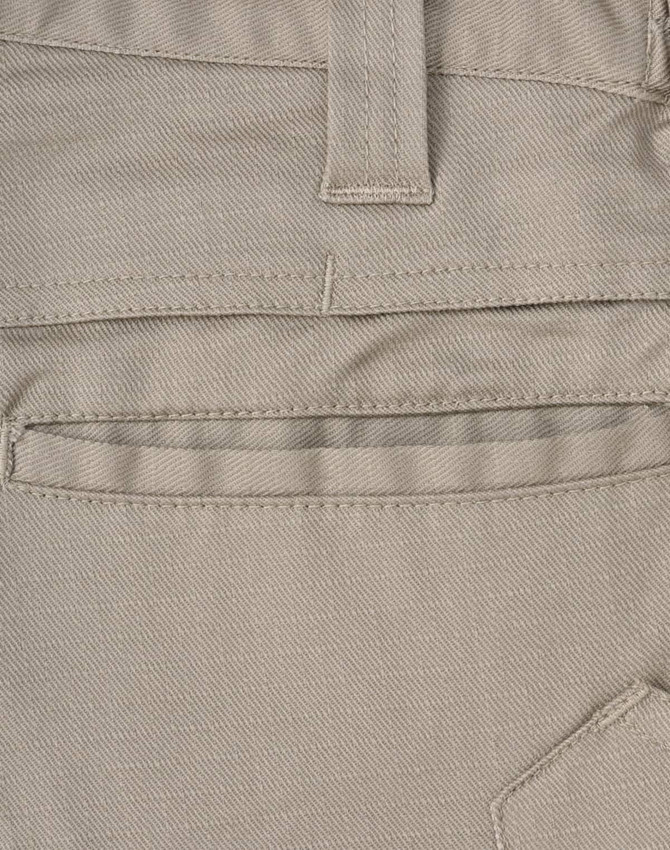 A close-up of unisex cotton stretch ripstop work shorts in a light beige colour, featuring a back pocket and stitching details.