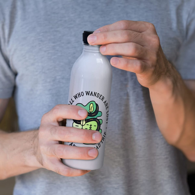 A drink bottle with a matte grey finish, featuring a playful design and a black screw-on lid.